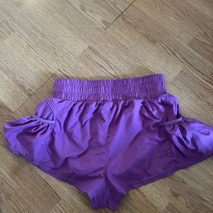 Frilly purple active shorts.